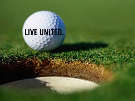 A golf ball with the words Live United resting above a hole